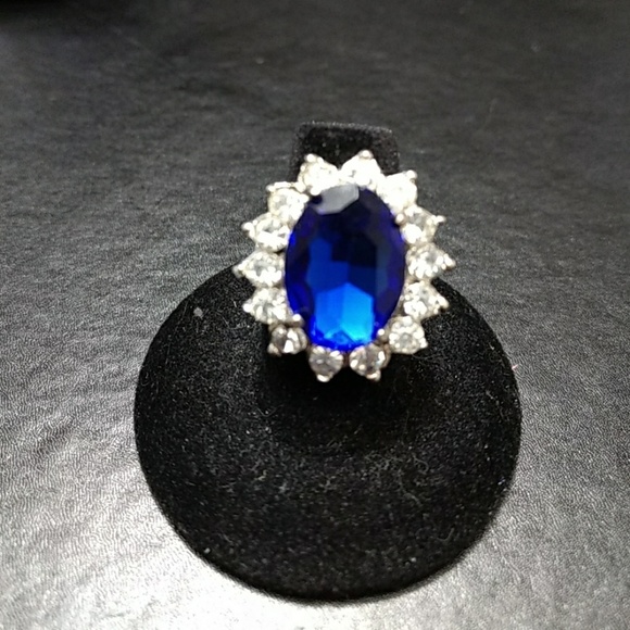 Jewelry - Silver tone ring with huge blue stone